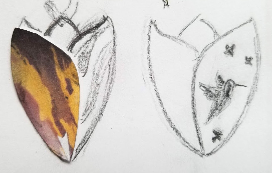 Mookaite with skitch of tulip pendant, hummingbird in back.