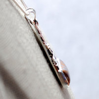 Boulder Opal Pendant with Rabbits, Tree closeup angle