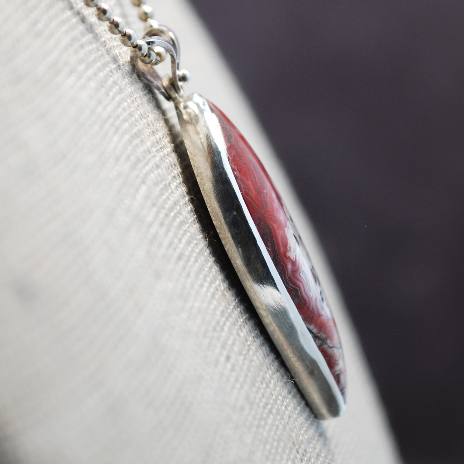 Crazy Lace agate pendant angle
