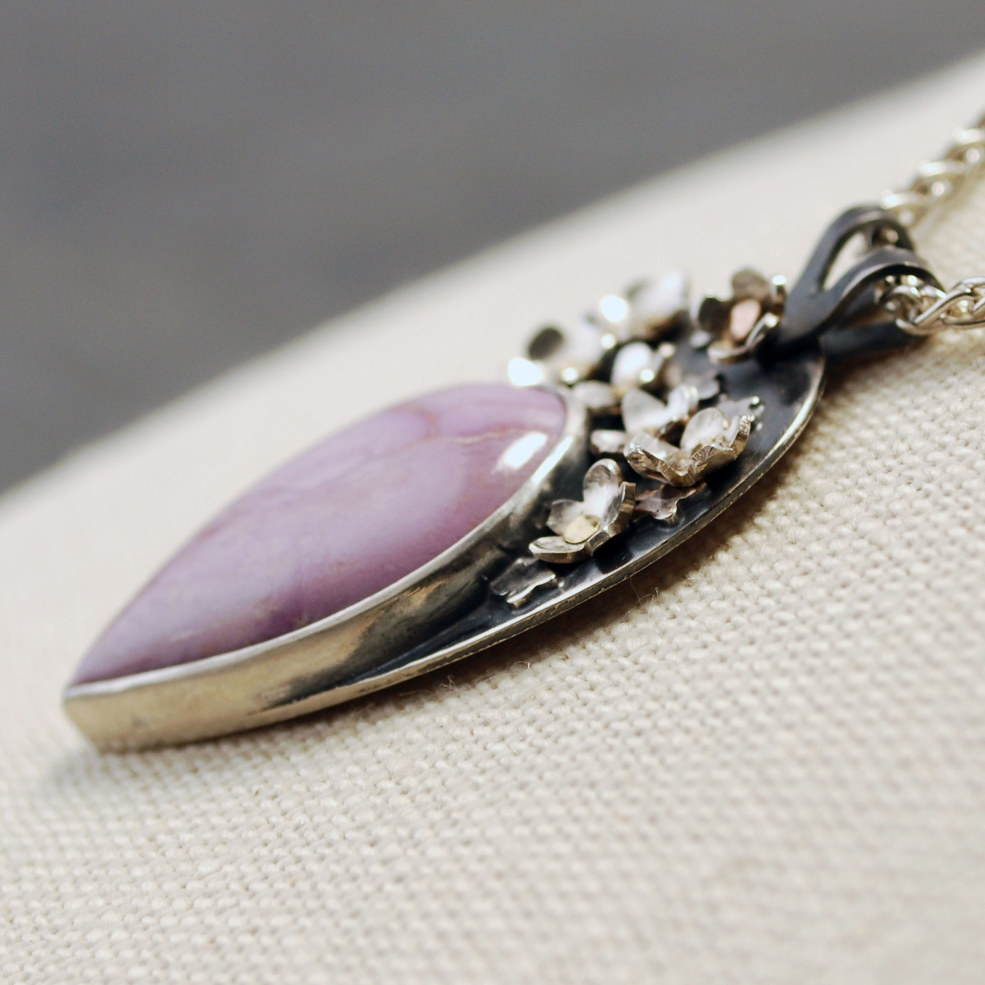 Pink Phosphosiderite Pendant, Silver with riveted Flowers close-up angle