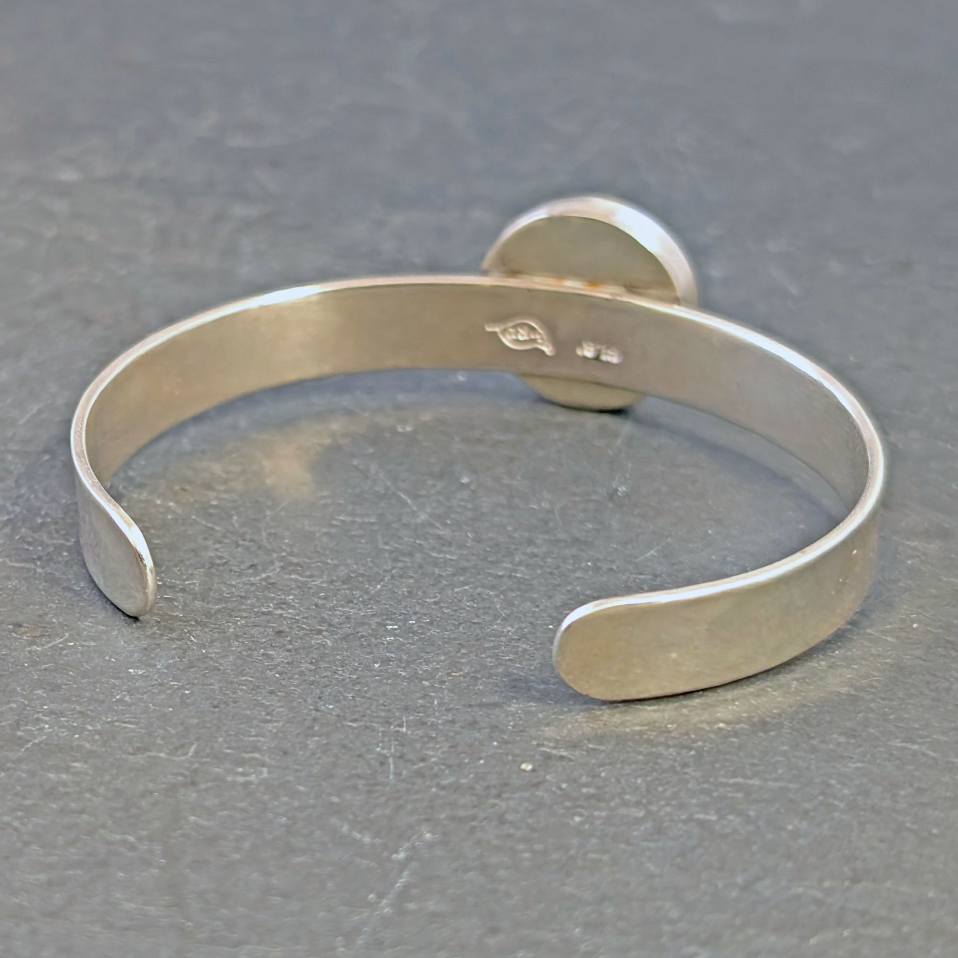 Silver Cuff Bracelet with Maw Sit Sit 