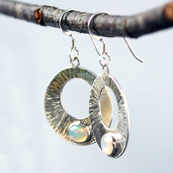 Silver Circle Earrings with Welo Opals hanging