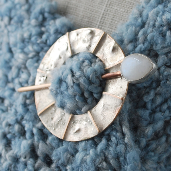 Bronze, Silver, Moonstone Scarf Pin, pinned to scarf closeup angle