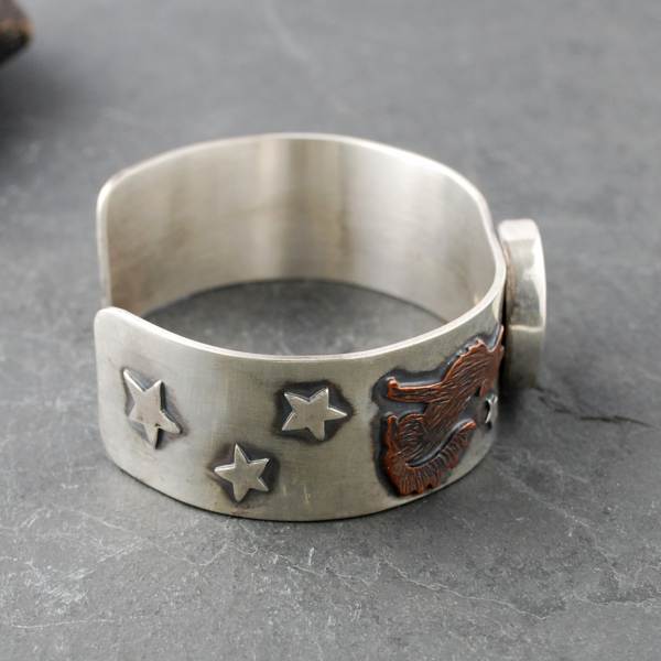 Silver Cuff with Fluroite, Coyotes, Wolves, Stars