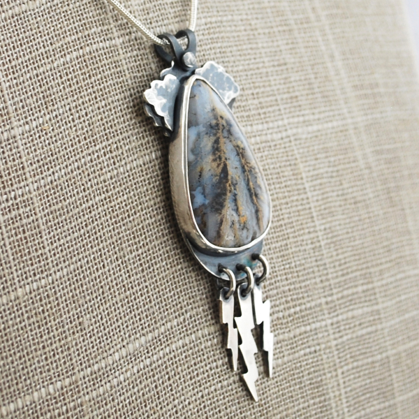 Graveyard Point Plume Agate Pendant with Lightning Bolts, angle