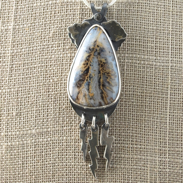Graveyard Point Plume Agate Pendant with Lightning Bolts, close-up