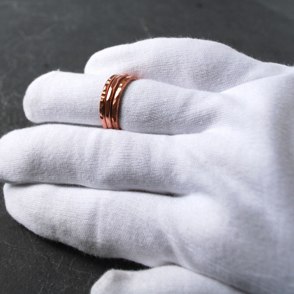 Hammered Copper Stacking Rings on finger