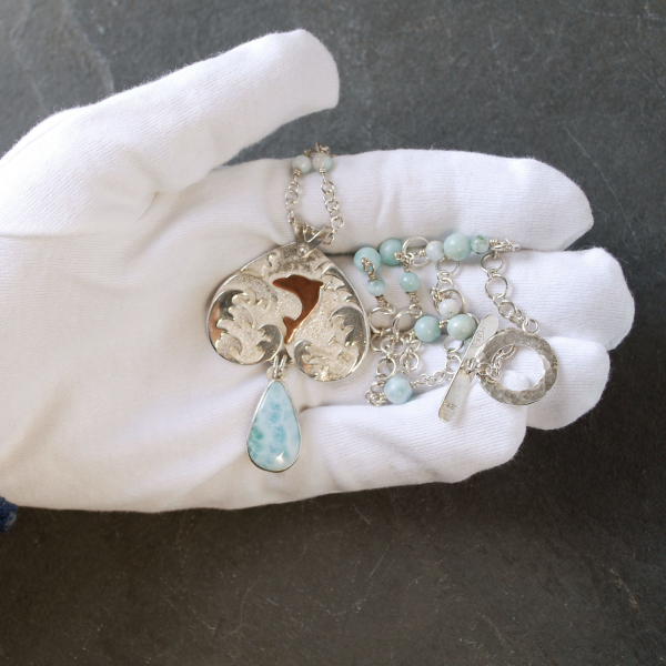 Larimar Pendant, Silver Waves, Dolphin, in hand