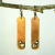 Bronze Dangle Earrings with Silver Dots