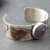 Silver Cuff with Fluroite, Coyotes, Wolves, Stars