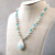 Larimar Silver Beaded Necklace, Larimar Pendant hanging at angle