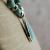Nacozari Turquoise, Silver, Copper Necklace, pendant close-up side view