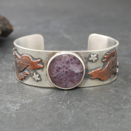 Silver Cuff with Fluroite, Coyotes, Wolves, Stars front