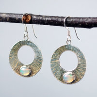 Silver Circle Earrings with Welo Opals hanging