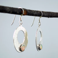 Silver Circle Earrings with Welo Opals hanging