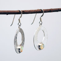 Silver Circle Earrings with Welo Opals hanging