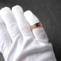 Hammered Bronze Stacking Rings on finger
