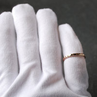 Hammered Bronze Stacking Ring on finger