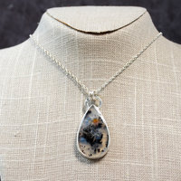 Marfa Plume Agate Pendant hanging as worn
