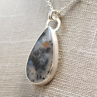 Marfa Plume Agate Pendant close up at angle