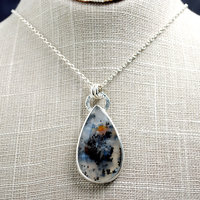 Marfa Plume Agate Pendant hanging as worn