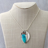 Chrysocolla Pendant with Bird and Cattail hanging