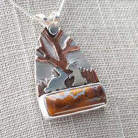 Boulder Opal Pendant with Rabbits, Tree closeup angle