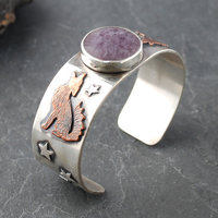 Silver Cuff with Fluroite, Coyotes, Wolves, Stars