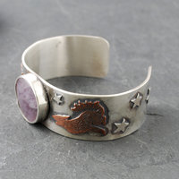 Silver Cuff with Fluroite, Coyotes, Wolves, Stars