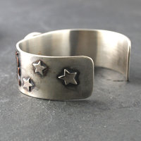 Silver Cuff with Fluroite, Coyotes, Wolves, Stars