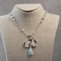 Larimar Pendant, Silver Waves, Dolphin, hanging