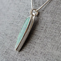 Silver Pendant with Maw Sit Sit