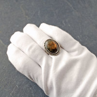 Golden labradorite sterling silver ring on the finger