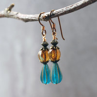 Dangling earrings with Czech Glass amber and blue beads hanging