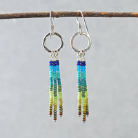 Silver earrings with blue and green dangles