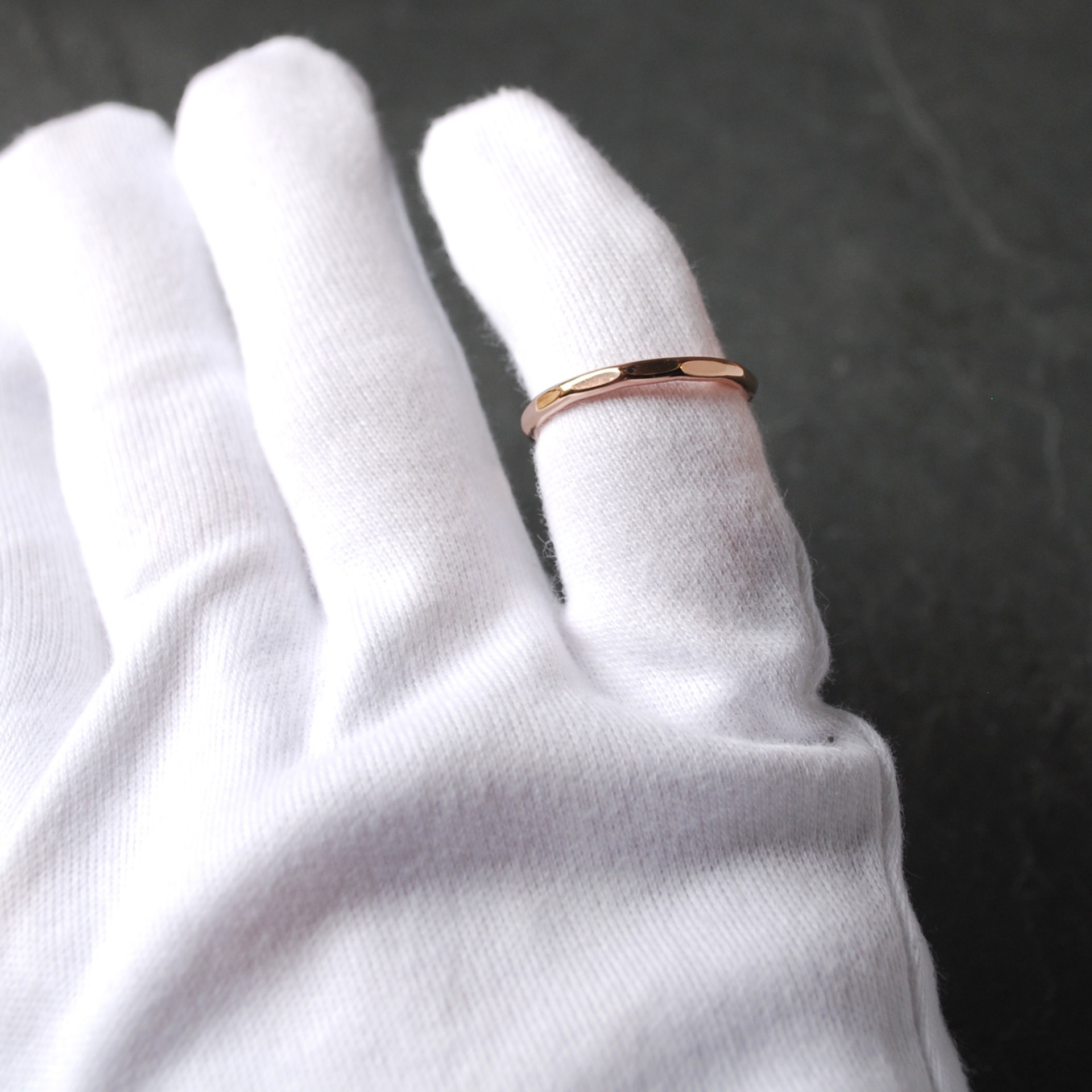 Hammered Bronze Stacking Ring on finger