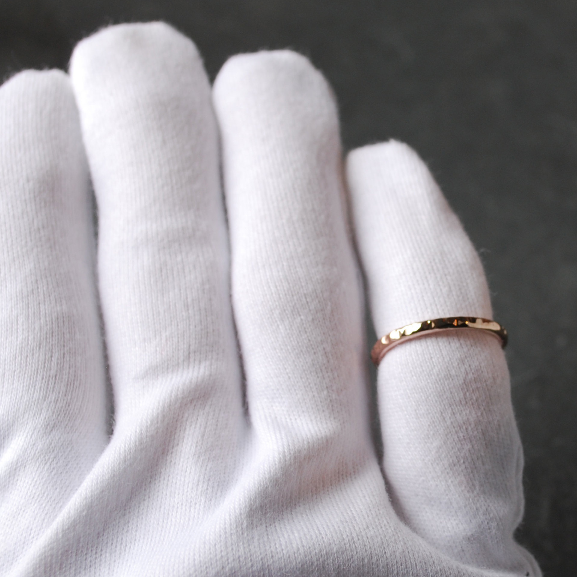 Hammered Bronze Stacking Ring on finger