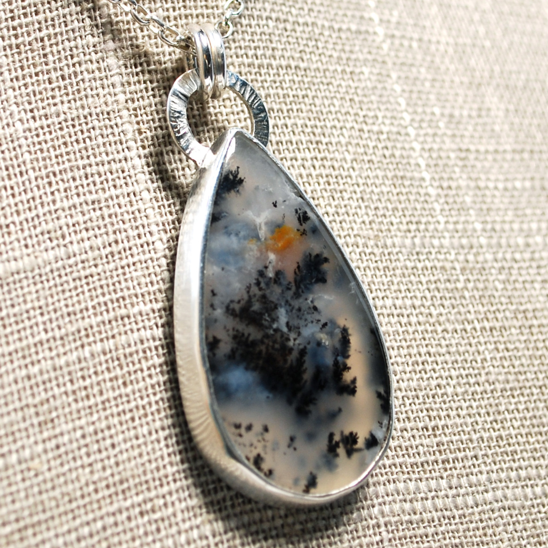 Marfa Plume Agate Pendant close up at angle