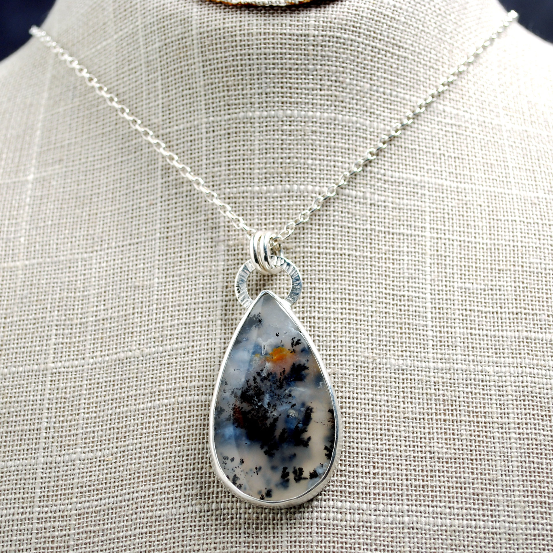 Marfa Plume Agate Pendant hanging as worn