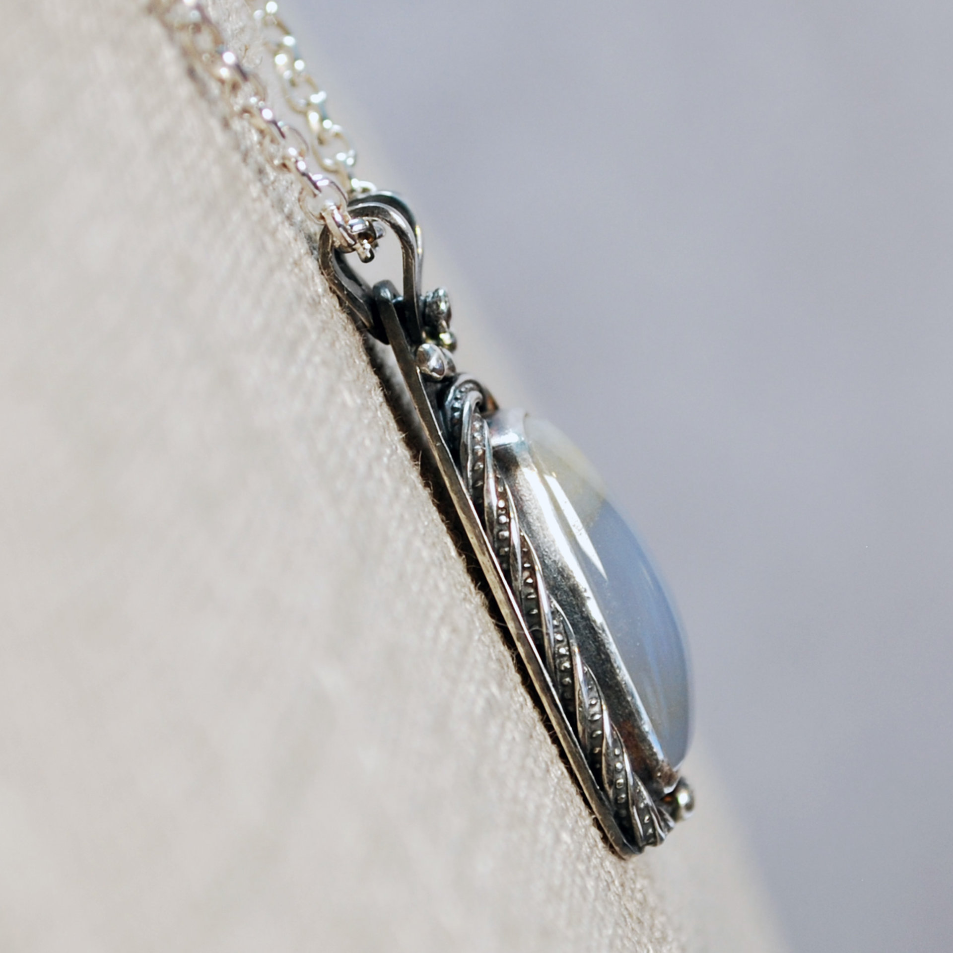 Blue Chalcedony and Silver Pendant closeup angle