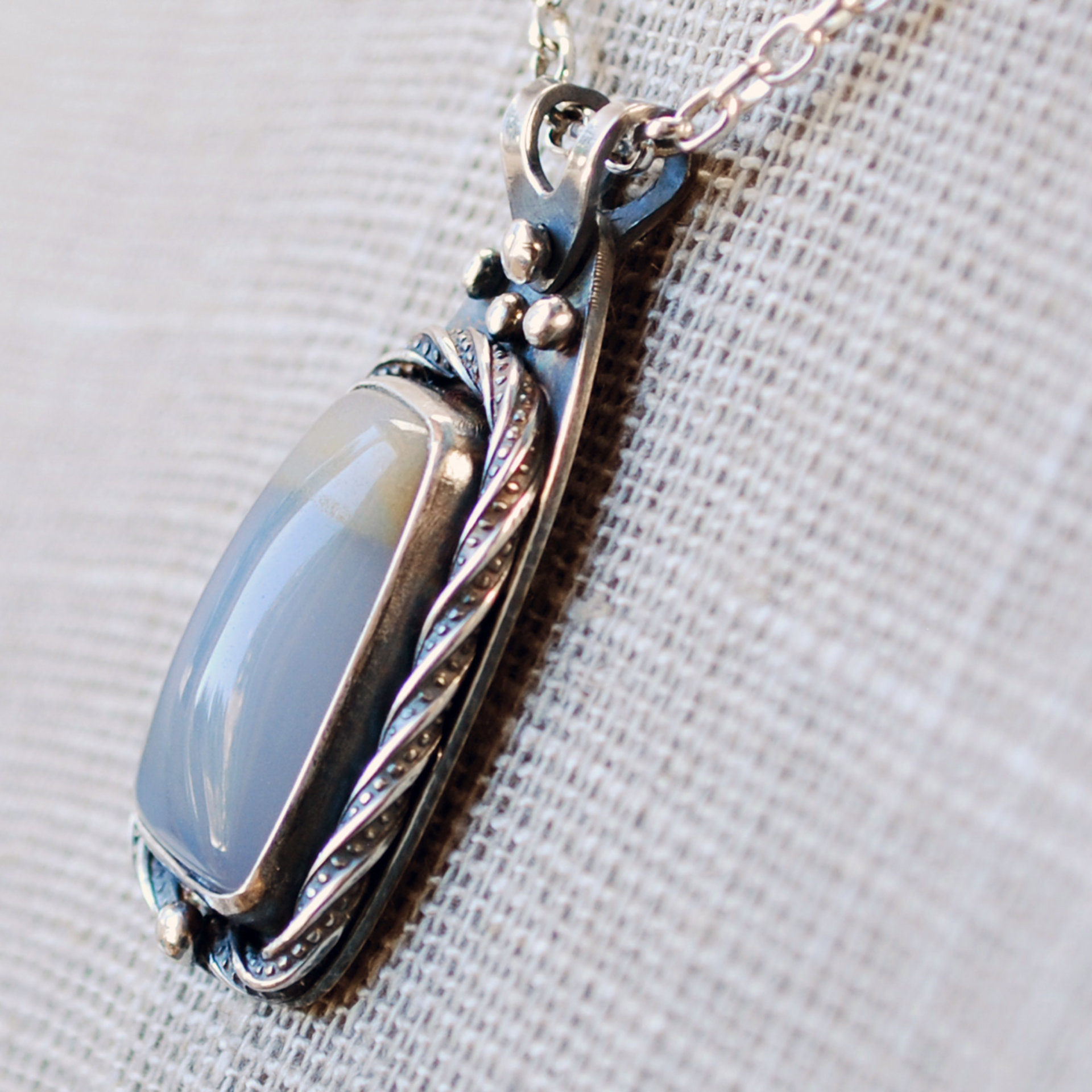 Blue Chalcedony and Silver Pendant closeup angle