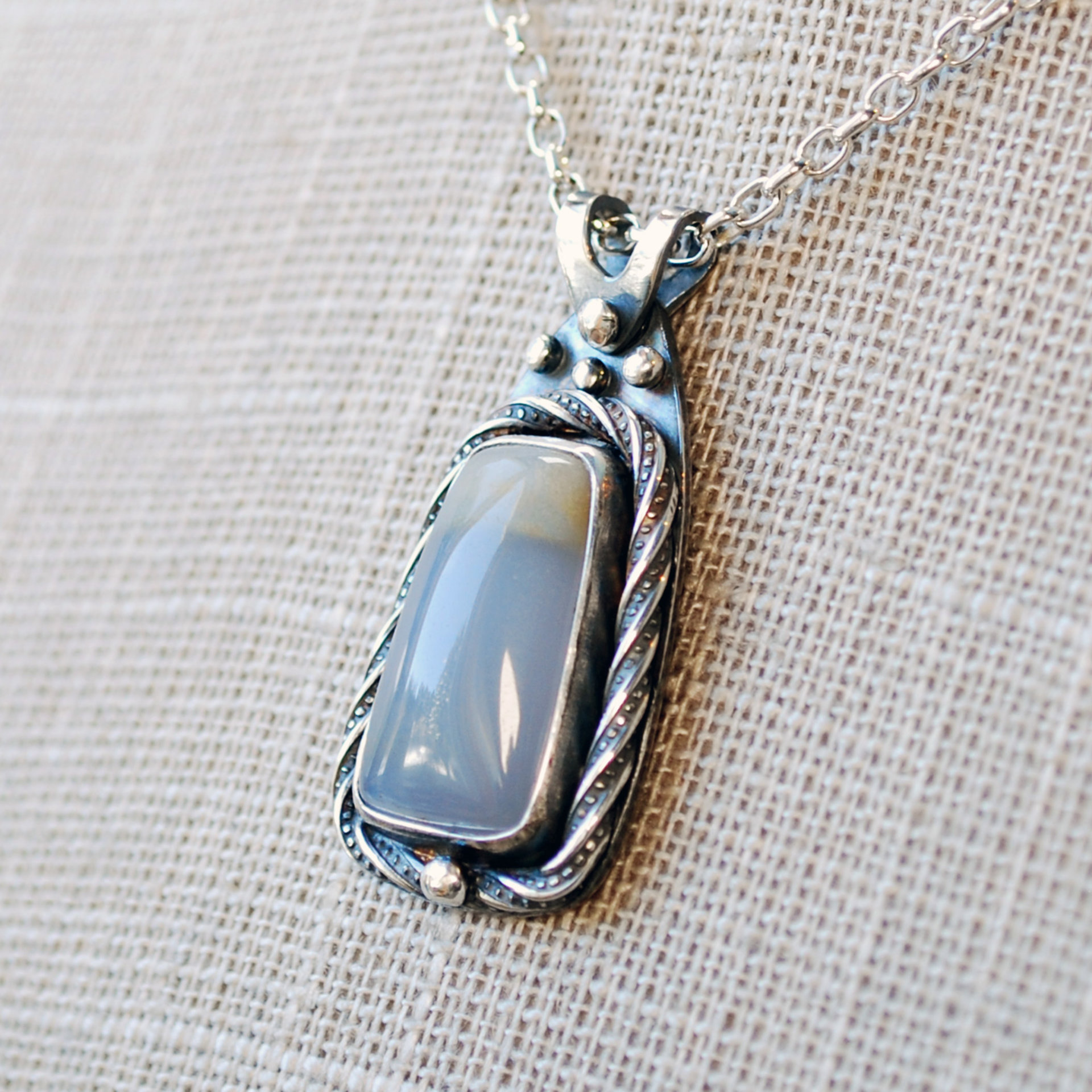 Blue Chalcedony and Silver Pendant closeup angle