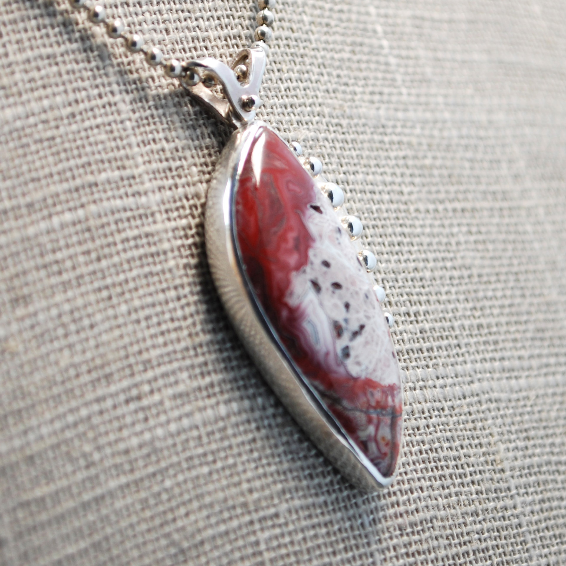 Crazy Lace agate pendant angle