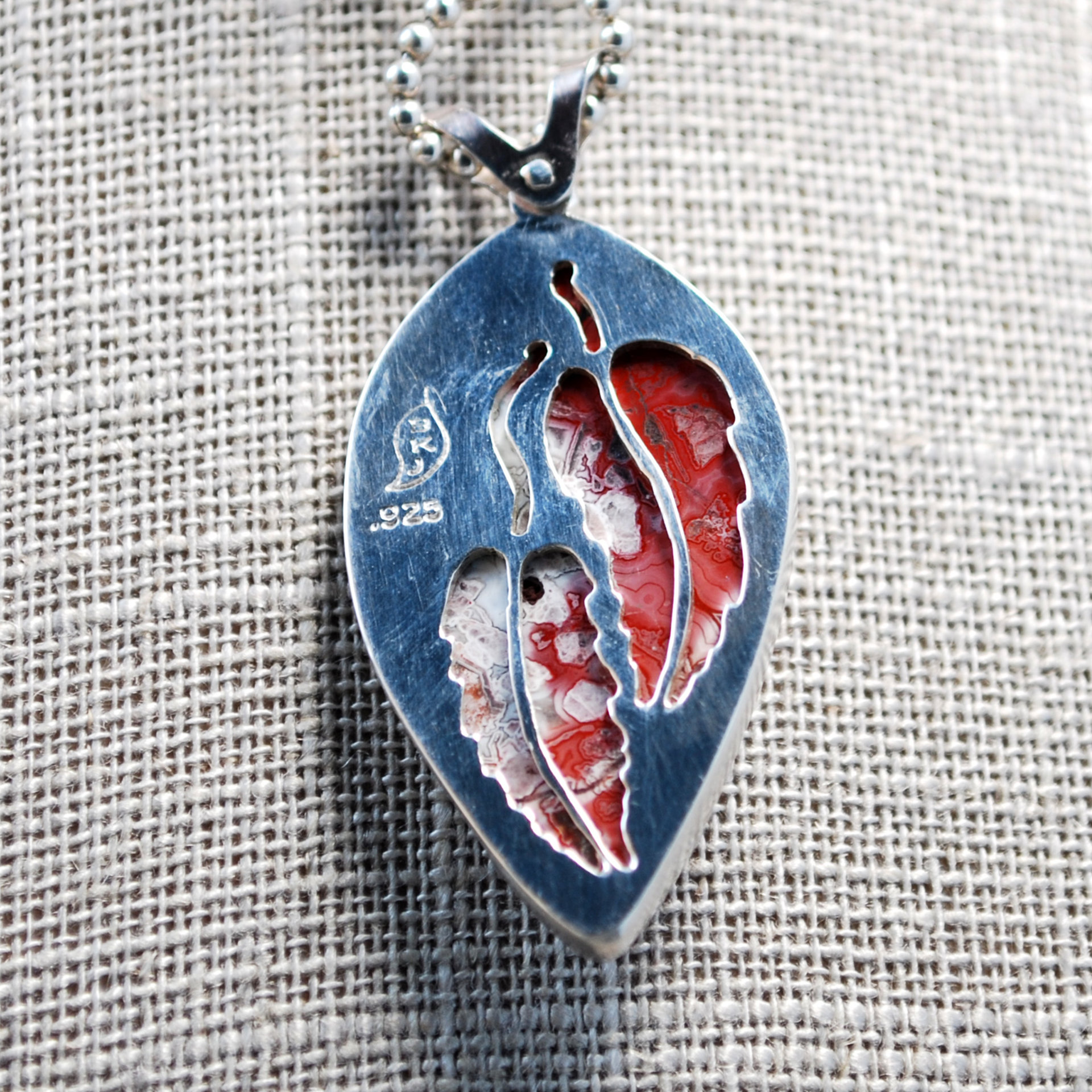 Crazy Lace agate pendant close-up back