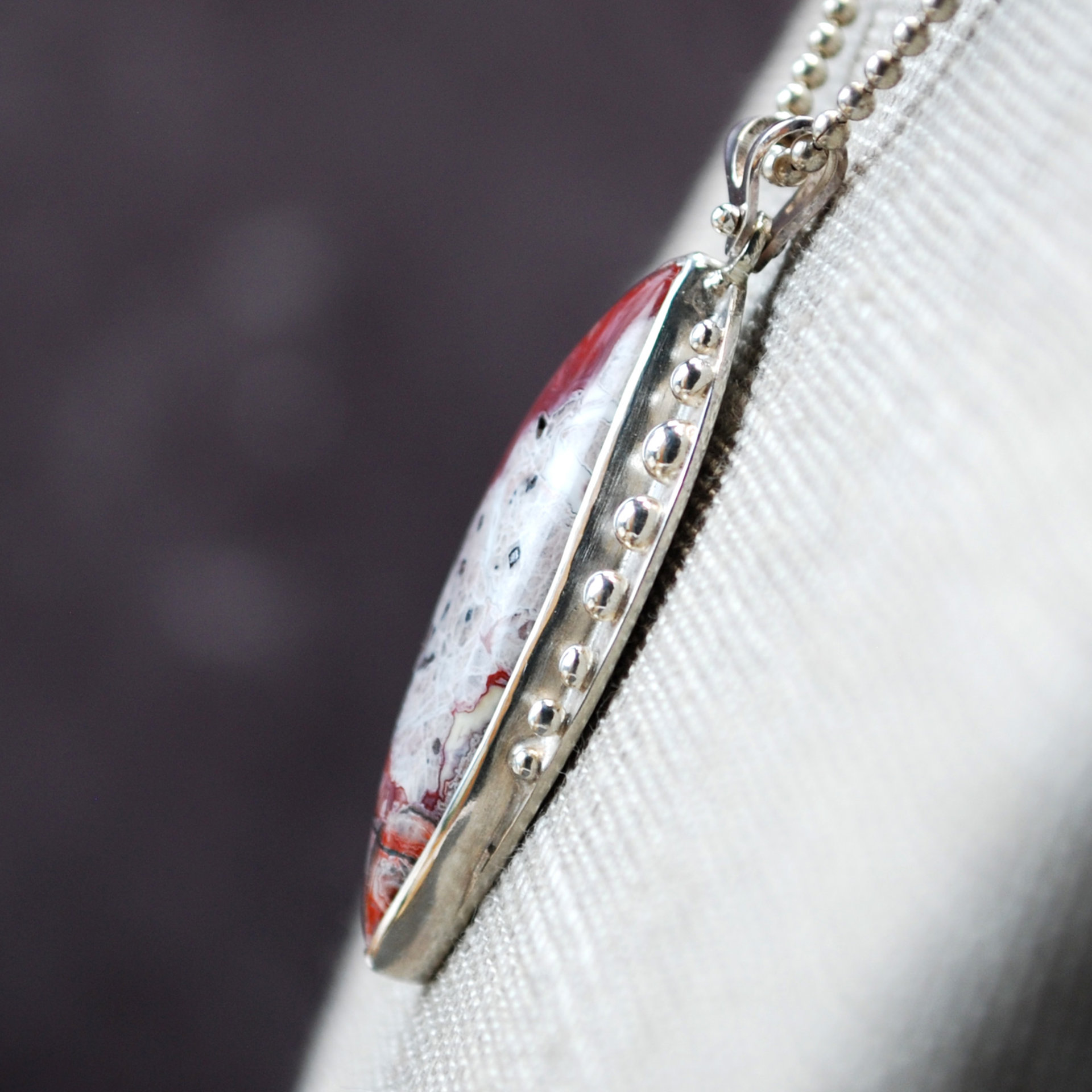 Crazy Lace agate pendant angle