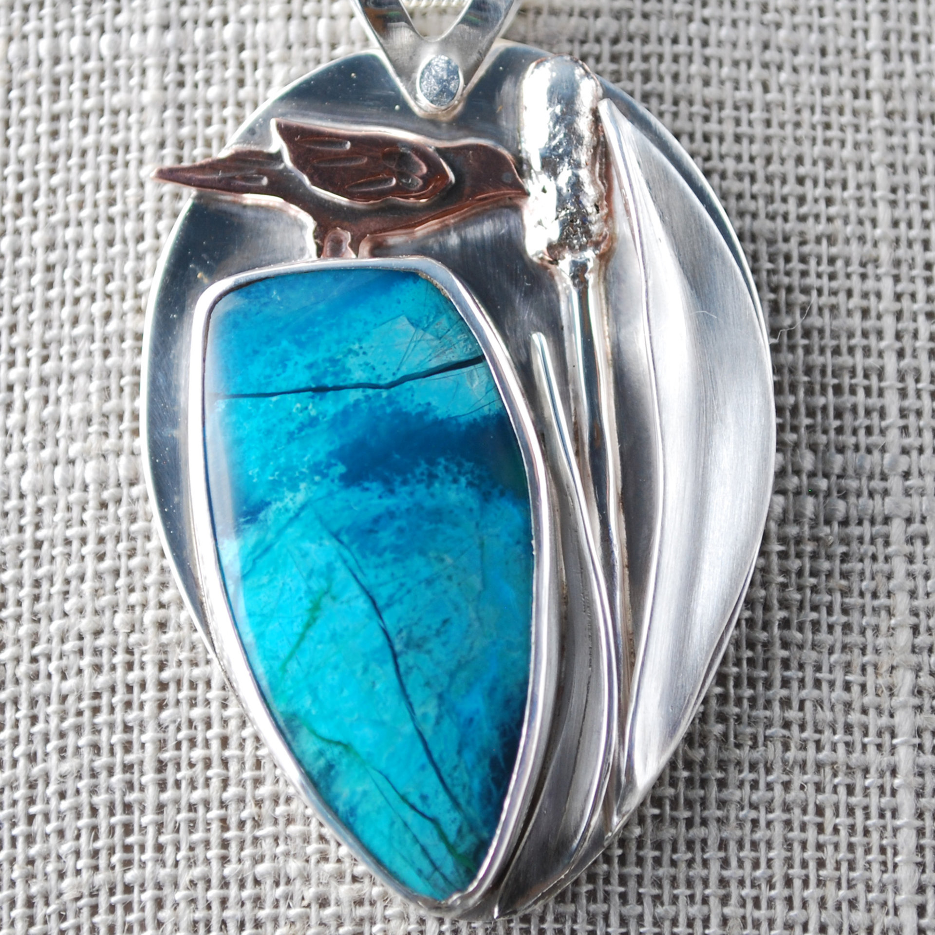 Chrysocolla Pendant with Bird and Cattail close-up