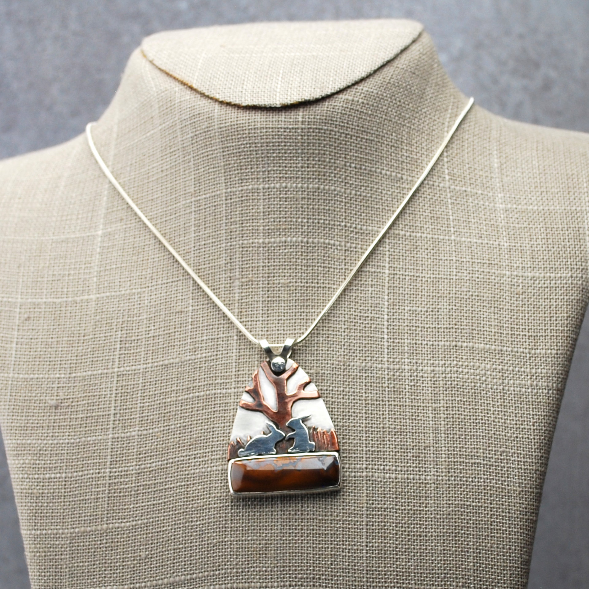 Boulder Opal Pendant with Rabbits, Tree hanging
