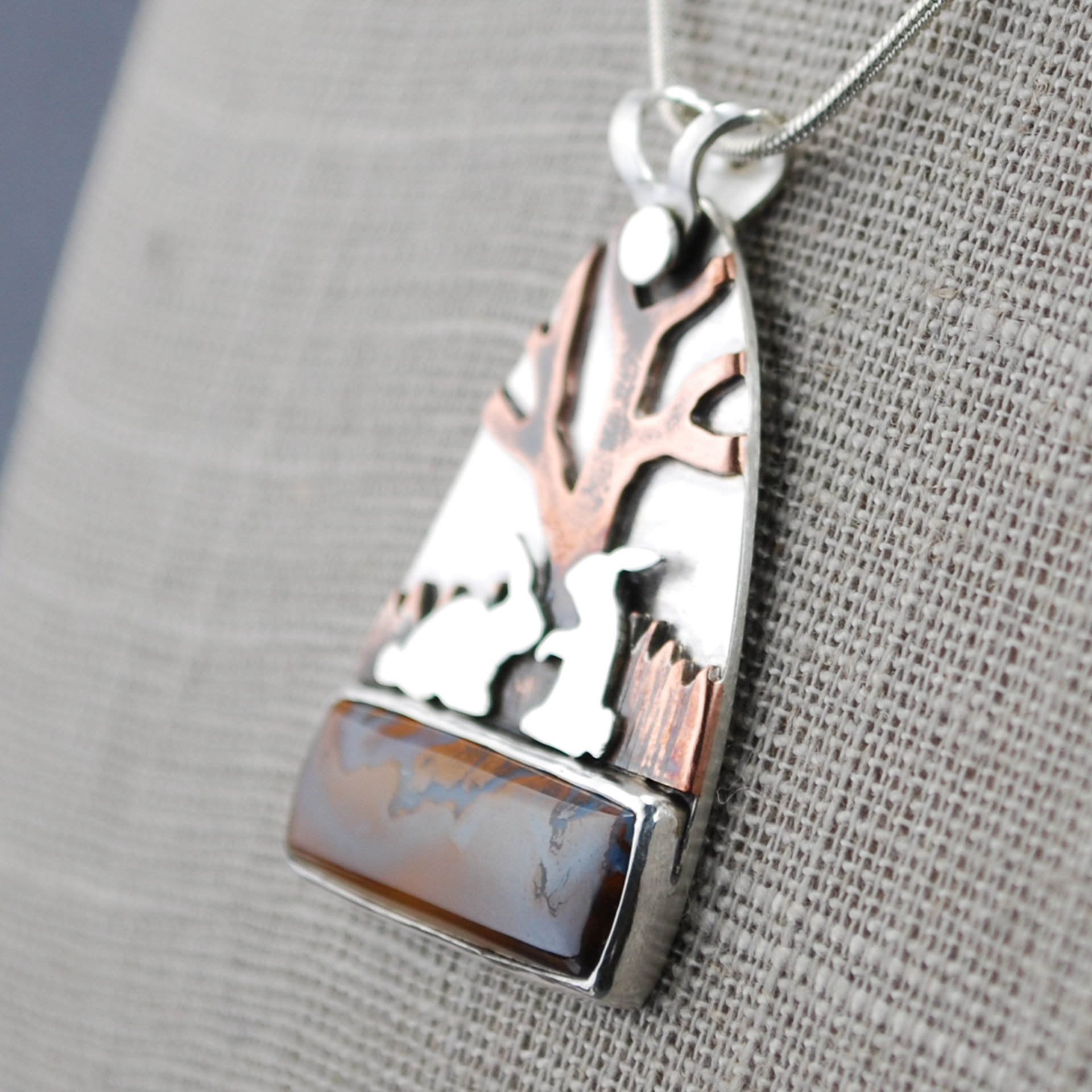 Boulder Opal Pendant with Rabbits, Tree closeup angle