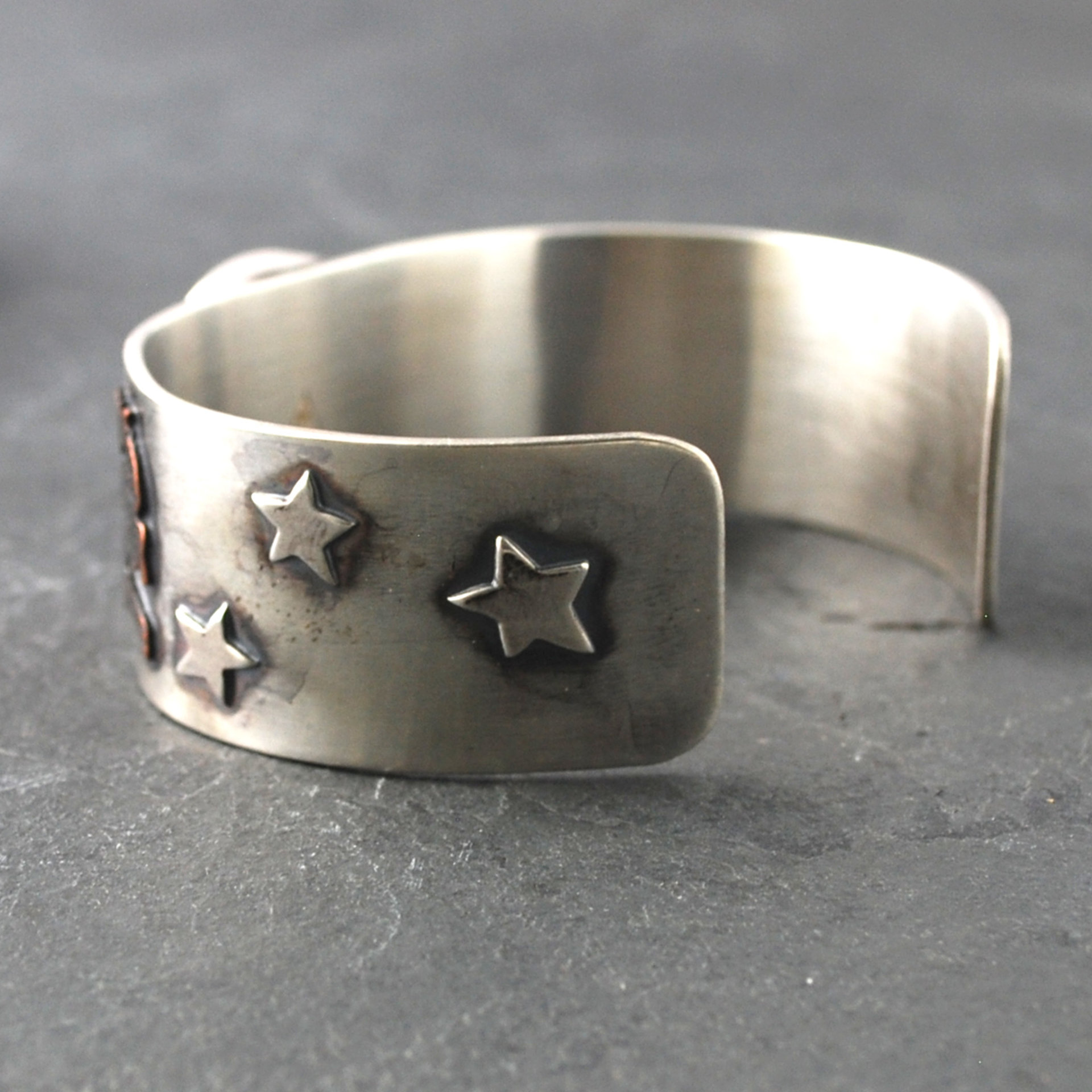 Silver Cuff with Fluroite, Coyotes, Wolves, Stars