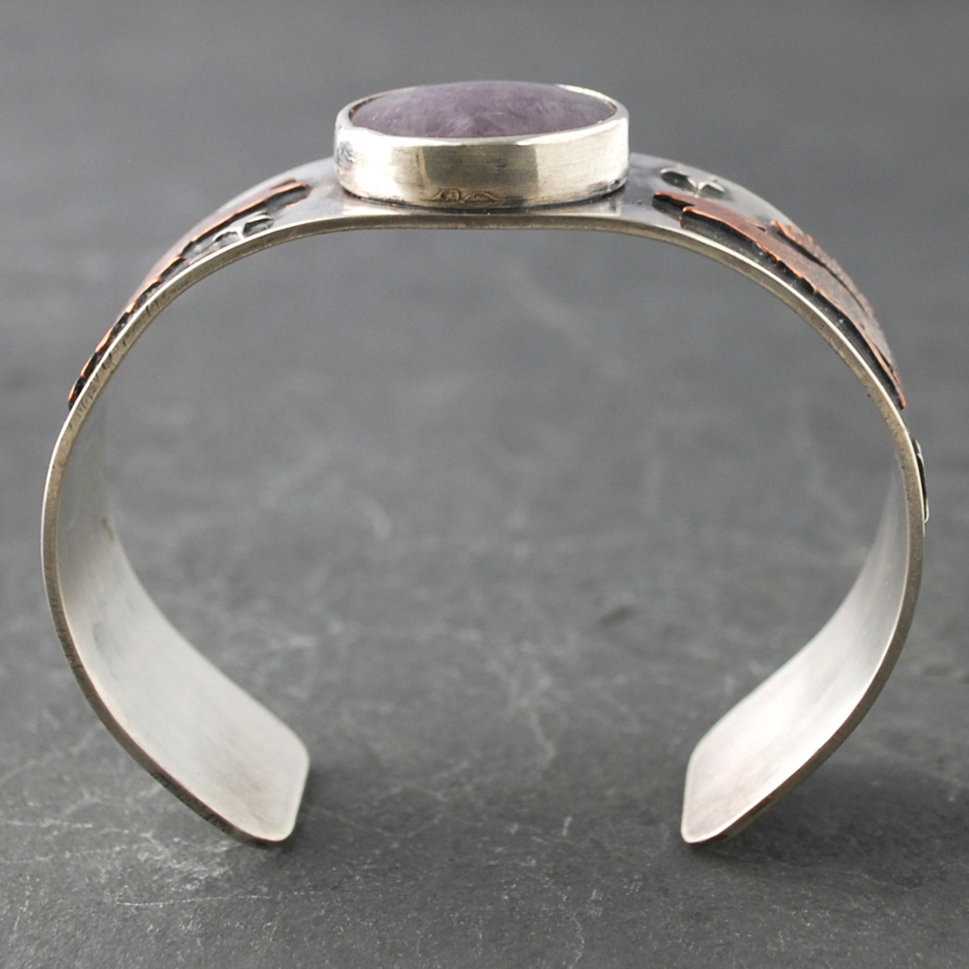 Silver Cuff with Fluroite, Coyotes, Wolves, Stars